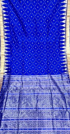 A gorgeous Sambalpuri silk saree with silver thread tissue border and anchal. This blue and silver highest quality mulberry silk saree is an exceptional blend of workmanship and quality. Pure silk saree Tissue Silk Saree, Pure Silk Saree, Blue Saree, Pure Silk Sarees, Mulberry Silk, Pure Silk, Silk Saree, Blue And Silver, Silk Sarees