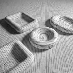 three pieces of furniture sitting on top of a floor