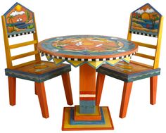 two children's wooden chairs and table with painted designs