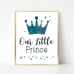 a poster with the words our little prince and a crown on it, against a white wall