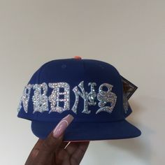 Custom Mix Size Full Bling Out Crystal Famous Nobody's Old English Embroidery Snapback Hat. Super Detail. 2 Other Colors Also Available, Hats Are Made To Order (This One Is Ready To Ship), Please Allow 2 Weeks To Ship For Custom Orders. Personal Hat, I Wasn't Looking To Sell But Only Willing To Sale For Asking Price. Price Includes The Cost Of This Limited Edition Twenty Two X Famous Nobody Hat (X Marks The Spot). Video Taken Without Flash. These Pics Doesn't Do This Hat Any Justice. Custom Fitted Hat, Fitted Hats Women, Bedazzled Hat, Customized Hats, Y2k Hats, Rhinestone Hat, Embroidery Hats, English Embroidery, Custom Fitted Hats