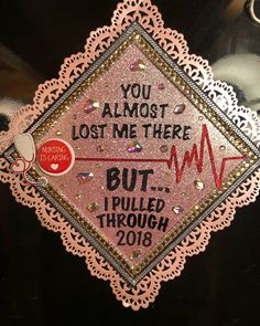 a pink graduation cap with the words you almost lost me there but i pulled through