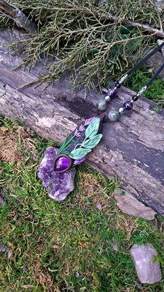 SOLD INDIVIDUALLY CHOOSE (A) OR (B Each handcrafted pendant features common sage (aka kitchen sage) and lavender above a teardrop amethyst.  Genuine Amethyst, Indian agate and Onyx beads adorn the vegan suede cord.  Artists Note: All pieces are handmade and therefore will have slight imperfections which are always apparent on the listed photographs. This is the nature of handmade items, which in my opinion adds to the character of each piece. You can rest easy knowing you have a unique one of a Mystical Handmade Purple Necklace, Handmade Mystical Purple Necklace, Bohemian Lavender Crystal Gemstone Necklace, Bohemian Lavender Gemstone Crystal Necklace, Handmade Lavender Crystal Necklaces Gift, Handmade Lavender Crystal Necklace Gift, Purple Handmade Magical Jewelry, Handmade Magical Purple Jewelry, Handmade Mystical Purple Crystal Necklace