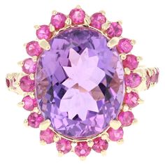 This ring has a Amethyst that weighs 9.49 carats and has 28 Pink Sapphires that weigh 1.37 carats. The total carat weight of the ring is 10.86 carats. The ring is crafted in 14 Karat Yellow Gold and weighs approximately 5.9 grams. The ring is a size 7 and can be re-sized at no additional charge. Expensive Jewelry Luxury, Jewellery Rings, Easter Greetings, Expensive Jewelry, Women Diamond, Yellow Gold Ring, Diamond Gemstone, Pink Sapphire, Yellow Gold Rings