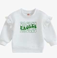 This White and Green Philadelphia Eagles Ruffle crewneck is the perfect addition to your little eagles fan's wardrobe! Check out similar items like this! https://www.etsy.com/listing/744851300/loved-onesie-unisex-baby-onesie-baby?ref=shop_home_active_1&frs=1 https://www.etsy.com/listing/744483004/send-milk-onesie-baby-onesie-bodysuit-0?ref=shop_home_active_5&frs=1 https://www.etsy.com/listing/758369231/sunglasses-onesie-custom-baby-onesie?ref=shop_home_active_4&frs=1 https://www.etsy.com/listing/758372127/hangry-onesie-baby-body-suit-custom?ref=shop_home_active_3&frs=1 Philadelphia Eagles Baby, Eagles Gear, Custom Baby Onesies, Ny Jets, Eagles Fans, Bubble Romper, Body Suit, Philadelphia Eagles, Oversized Sweatshirt