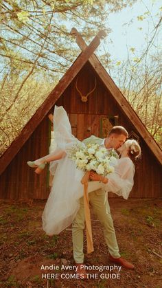 a bride and groom are kissing in front of a small chapel with the caption here comes the guide