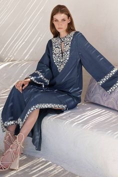 Blue chambray kaftan with white mirror embroidery on the yoke and border. - Aza Fashions Bohemian Kurta With Mirror Work For Spring, Bohemian Spring Kurta With Mirror Work, Spring Bohemian Kurta With Mirror Work, Chanderi Kaftan With Mirror Work, Summer Kaftan With Mirror Work In Straight Kurta Style, Summer Straight Kurta Kaftan With Mirror Work, Festive Chanderi Kaftan With Mirror Work, Summer Embroidered Neckline Straight Kurta Kaftan, Summer Kaftan With Embroidered Neckline