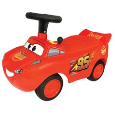 a red toy car with the number 95 on it