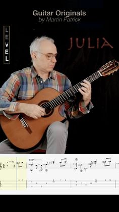 an image of a man playing the guitar