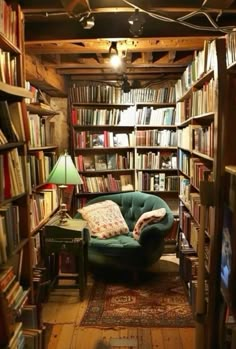 a room filled with lots of books and furniture