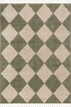 a rug with green and white squares on it