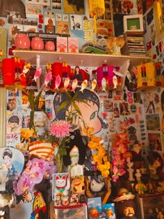 a room filled with lots of different types of decorations and pictures on the wall above it