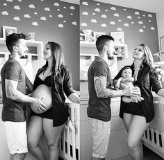 a man and woman standing next to each other near a baby in a crib