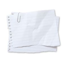 two pieces of lined paper on top of each other with a clip in the middle