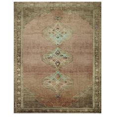 an antique rug with various colors and patterns on it, including beiges, browns,