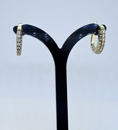 These earrings are made of solid 14k yellow gold and feature a classic clip back design for easy and secure wear. Each earring features a single row of 7 prong-set natural diamonds, totaling 14 diamonds in all. The diamonds are high-quality and add a touch of luxury to the piece. In total, the earrings weigh 4.50 grams and have a combined diamond weight of 0.21 carats SI CLEARITY -G-I COLOR  The diamonds are arranged in a linear fashion, with each stone carefully set to showcase its brilliance a Back Design, Jewelry Earrings Studs, Prong Setting, Natural Diamonds, Timeless Design, Etsy Earrings, Jewelry Collection, Etsy Accessories, Great Gifts