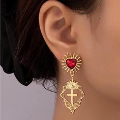 “Sacred Heart Cross” Exploding Sunburst Red Gemstone Fiery Ornate Elaborate Framed Christian Catholic Faith Pray Holy Gold Stud Post Dangle Earrings. Red Gemstone Heart With Golden Sunburst/Sunrays Surrounding It Attached To The Posts. An Cross With An Ornate/Elaborate Frame With Flames At The Top Dangles Below. Lovely! 925 Sterling Silver Posts. Hypoallergenic. Lead & Nickel Free. New. *Also Available In Silver! Measurements: Eardrop Length: 2” Earring Width: 0.8” If You Want It, Don’t Let It G Red Heart Accessories, Red Heart Earrings For Wedding, Red Heart Earrings For Valentine's Day Wedding, Red Heart Earrings For Wedding On Valentine's Day, Red Dangle Heart Earrings For Wedding, Vintage Red Heart Earrings For Pierced Ears, Red Drop Heart Earrings For Wedding, Red Heart Drop Earrings For Wedding, Red Vintage Heart Earrings For Gifting