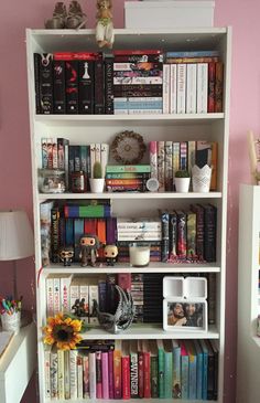 a book shelf filled with lots of books