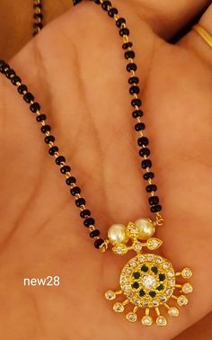 Stunning one gram gold chain with black beads. Black bead with pendant.  04 October 2019 Yellow Gold Necklace With Black Beads For Gift, Gold Necklaces With Black Beads For Festivals, Gold Jewelry With Black Beads For Puja, Gold Necklace With Black Beads For Puja, Single Line Black Beads Chain Gold, Pendant Set, Black Beads, Gold Chains