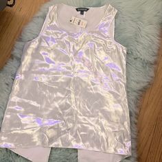 New With Tags. Blouse Is Split In The Back, Satin Silver Metallic Material Casual Tank Blouse For Party, Tank Vest Blouse For Night Out, Spring Tank Vest For Night Out, Spring Party Tank Top With Scoop Neck, Spring Tank Blouse For Night Out, Metallic Silver, Scoop Neck, Split, Top Blouse