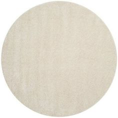 a round white rug on a white background