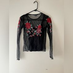 American Eagle Black Swiss Dot Lace Top With Floral Embroidery Long Sleeve There Is A Black Tank That Is Attached/Is Part Of The Shirt Shown In The Last Two Pictures Size: Xs Color: Black With Green, Red And Pink Embroidery Nwot Offers Are Welcomed Smoke And Pet Free Home Don’t Hesitate To Ask For More Pictures Or Measurements Black Tops With Floral Embroidery For Night Out, Black Top With Floral Embroidery For Night Out, Black Long Sleeve Tops With Floral Embroidery, Black Crew Neck Blouse With Floral Embroidery, Trendy Black Tops With Floral Embroidery, Black Floral Embroidered Long Sleeve Tops, Black Embroidered Tops For Night Out, Black Blouse With Floral Embroidery For Night Out, Black Embroidered Stretch Tops