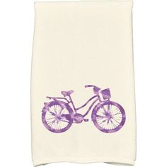 a tea towel with a pink bicycle on it's front and back ends are folded