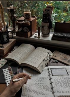 an open book sitting on top of a desk