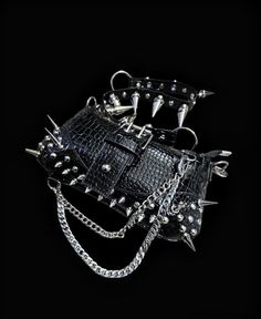 Black Punk Shoulder Bag With Rivets, Edgy Shoulder Bag With Hardware For Alternative Fashion, Edgy Black Shoulder Bag With Rivets, Gothic Shoulder Bag With Rivets For Alternative Fashion, Black Party Bag With Hardware, Black Party Bag With Hardware Details, Punk Style Rivets Bag For Concerts, Punk Style Rectangular Party Shoulder Bag, Edgy Party Crossbody Bag