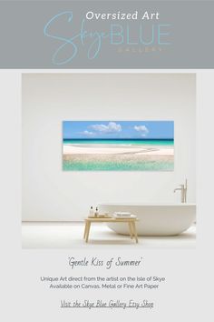 a white bath tub sitting under a blue sky above the ocean in front of a beach