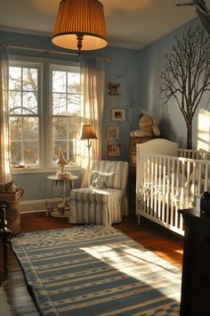 a baby's room with blue walls and furniture