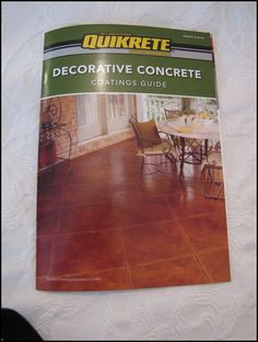 the book quikrete decorative concrete coatings guide is laying on top of a bed