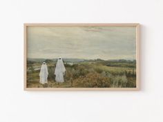 two ghost figures standing in front of a painting on a white wall next to a wooden frame