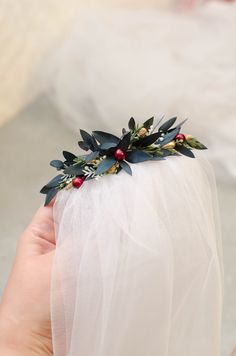 Floral hair comb for bride, bridesmaid, or flower girl Comb size - 8,5 cm (3,5 inches) Length of floral part ~ 12-13 cm (5 inches) Matching boutonniere, flower bracelet, hair crown can be made to order along with this accessory here: https://www.etsy.com/listing/735358517 Explore more items at mavkastore.etsy.com Holiday Winter Hair Jewelry, Bridal Veils For Christmas Bride, Evergreen Hair Clip, Forrest Hair Pieces, Holly Hair Piece, Hair Comb With Veil, Boutonniere Eucalyptus, Greenery Hair Piece, Hair Accessories For Bride