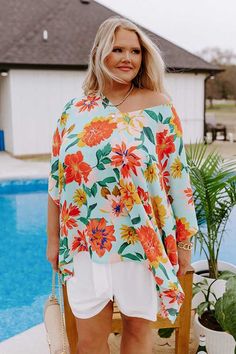 - Create your own sunshine in this stunning tunic! - Unlined, breezy chiffon material patterned with a colorful abstract floral print - A v-cut neckline - Oversized bat-wing half sleeves - An ultra relaxed silhouette that falls into an uneven upper-thigh length hemline Create Your Own Sunshine, Bat Wing, Abstract Floral Print, Relaxed Jeans, Chiffon Material, Ocean Wave, Distressed Shorts, V Cut, V Cuts