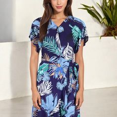 Elevate your summer wardrobe with the Anna-Kaci Women's Tropical Print High-Low Wrap Dress. This eye-catching dress features a vibrant tropical print that exudes island vibes, perfect for warm-weather adventures. The wrap design offers a flattering fit, accentuated by a waist tie that cinches beautifully at the waist. Flutter sleeves add a touch of femininity, while the high-low hemline provides a playful yet elegant silhouette. Whether you're headed to a beachside brunch or a casual day out, th Midi Slip Dress, Ballet Dress, Island Vibes, Mini Skater Dress, Women Midi, Women Maxi, Dress 16, Caps For Women, Trending Dresses