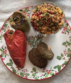 an assortment of food on a floral plate