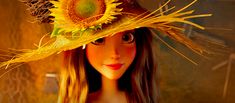 a doll wearing a hat with a sunflower on it's brimmed