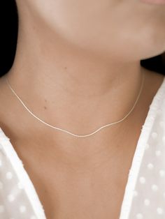 Highlights • Made With 14k Gold Filled or Sterling Silver Pieces • Available In 14”, 16”, 18”, 20”, 22” Lengths • 1mm Width About This Piece Our simple and minimal necklaces are made to suit anyone and will last a lifetime! Layer these chains with any necklace for a trendy, custom look. Minimalist White Jewelry With Box Chain, Minimalist White Box Chain Jewelry, White Minimalist Snake Chain Jewelry, Minimalist White Snake Chain Jewelry, Minimalist Hypoallergenic Sterling Silver Chain Necklace, Simple White Gold Jewelry With Delicate Chain, Minimalist Hypoallergenic Snake Chain Necklace, Minimal Necklace, Snake Necklace