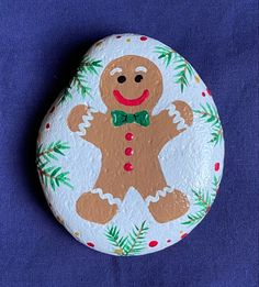 a painted rock with a ginger on it