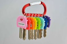 a bunch of keys that are hanging from a keychain with the word garage on it