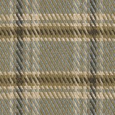 a close up view of a plaid fabric textured with blue and beige colors,