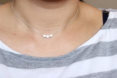 This heart necklace doesn't have initial on it. If you want the initial heart necklace, please follow the link to see itInitial heart necklace:https://www.etsy.com/listing/236533468/tiny-dainty-initial-heart-necklace?ref=shop_home_active_1&ga_search_query=heart%2BnecklaceYou can add more than one heart charm to the necklace. Please select the number of heart charm you want at the drop out menu. Also availalbe in bracelet and anklet. Please go to my shop to see the listings or if you have any que Heart Shaped Charm Necklaces For Best Friend, Minimalist Heart Charm Necklace For Best Friend, Dainty Heart Pendant Necklace For Best Friend, Heart-shaped Charm Necklaces For Best Friend, Heart Shaped Minimalist Charm Necklace For Best Friend, Dainty Heart Pendant Charm Necklace For Best Friend, Dainty Heart Charm Necklace For Best Friend, Dainty Heart Charm Necklace For Best Friend Gift, Dainty White Necklace For Best Friend Gift