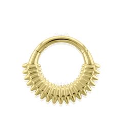 a gold nose ring with spikes on it