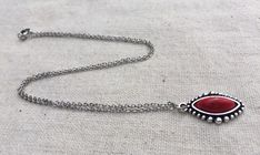 "Simple, chic and versatile! Here is a red stone necklace that is set in a perfectly detailed silver frame. The perfect everyday necklace! Made from allergy free plated silver. The pendant measures 1\" long by 1/2\" wide. It hangs from a shiny strong 18\" stainless steel necklace chain with a lobster clasp. I have matching earrings in my shop if you would like the whole set. Here is the link https://etsy.me/2R5NsWx I have this same style pendant necklace available in other color ways as well! He Southwestern Style Red Necklace For Gift, Red Bohemian Teardrop Necklace, Red Southwestern Turquoise Necklace For Gift, Nickel-free Southwestern Style Necklace As Gift, Southwestern Style Nickel-free Necklace For Gift, Red Southwestern Sterling Silver Necklace, Southwestern Style Teardrop Pendant Jewelry Gift, Red Southwestern Style Jewelry Gift, Southwestern Style Red Jewelry For Gift