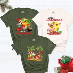 Experience the magic of a tropical Christmas with our "Tropical Beach Family Christmas Shirt." Embrace the Mele Kalikimaka spirit with Hawaiian Santa, making your holidays bright and sunny. Celebrate Christmas in the warm embrace of summer, and let your Xmas Group Party Shirts reflect the unique joy of a beachside holiday. These shirts capture the essence of a Christmas vacation in the sun, a perfect blend of tradition and relaxation. Whether you're strolling on the sandy shores or having a fest Hawaiian Short Sleeve Top For Holiday, Hawaiian Holiday Top With Short Sleeves, Hawaiian Style Short Sleeve Top For Holiday, Holiday Tropical Short Sleeve Top, Tropical Short Sleeve Top For Holiday, Mele Kalikimaka, Xmas Tees, Tropical Christmas, Santa Shirts