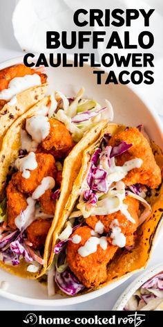 crispy buffalo cauliflower tacos in a white bowl