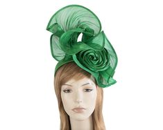 This green fascinator is made to perfection in Australia and will be a perfect addition to your Melbourne Cup racing outfit. Beautiful drape design coupled with luxurious silk abaca fabric create really magnificent look that will turn heads. Please allow few days for creation of your perfect fascinator.  Made in Australia  Bespoke design  Headband for easy wear Elegant Green Headband For Races, Elegant Green Headband For Party, Elegant Green Hat For Evening, Elegant Green Fitted Headpiece, Elegant Fitted Green Headpiece, Elegant Fitted Green Headband, Green Evening Fascinator, Green Fitted Fascinator For Evening, Elegant Green Hat For Races