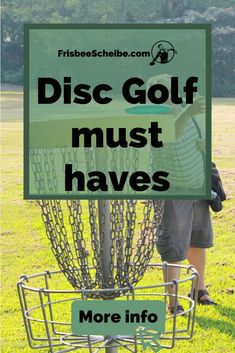 a man standing next to a metal disc golf basket