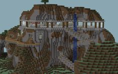 an image of a house built into the side of a mountain in minecraft style